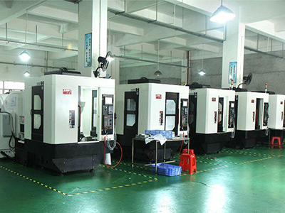 The picture shows several CNC machine for producing storz fire fighting coupling.